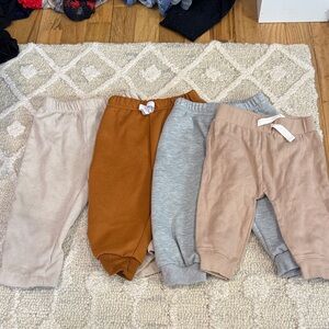 FOUR pairs of boys size 6-9 month pants